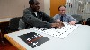 Blind Consultant reviewing tactile map and signs with engineer