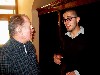 Artist Howard Cruse, left, talks with Alex Kauffman about his scratch and sniff videos.
