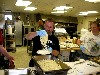 Dishing out the pasta.