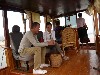 Laotian guide Ole (left) with Thai trip leader Leki enjoying a snack on the boat