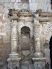 Decorative niches by the front entrance.