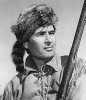 Fess Parker portrayed Davy Crockett on the Disney TV show in the 1950s.