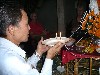 Shaman conducting rice offering ceremony