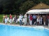 Gathering on the edge of  the pool.