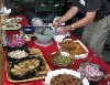 Sampling an array of traditional dishes.