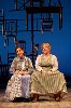A cozy scene between the mothers Mrs Webb (Jessica Hecht) left and Mrs. Gibbs (Becky Ann Baker).