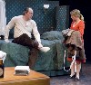 Colm prepares for bed with Timothea (Kristin Wold) in her Liverpool flat.