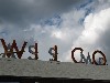 The new Wilco sign on a Mass MoCA roof.