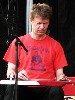 Nels Cline playing slide guitar.