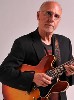 A penultimate guitarist