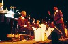 Basie conducting the band.