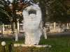 Buddha statue by road