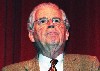 The conservative views of the first speaker, Bill Little, former Chairman of the U.S. Chamber of Commerce, evoked comparisons to the rhetoric of the Tea Party,.