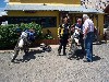 Charles and two new biker friends in front of an organic food restaurant. Diane, an emergency room nurse, and John, a medical researcher.