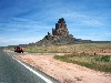 Monument Valley, Arizona ~ a car measured against a rock !