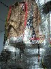 Wall Curtain by African artist El Anatsui, made of soda can or beer bottle tops.