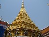 Khon figures guard a stupa at the Grand Palace