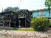 Stilt houses by river&rsquo;s edge
