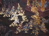 Mural adorning the inside wall of Wat Phra Kaeo 