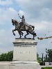 A sculpture of Saint Louis in front of the museum.