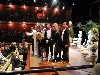 Members of the wedding party on stage.
