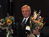 Richard A. Mescon the Chairman of the Board of Trustees.