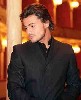 Vittorio Grigolo is so handsome and charming and sweet that it may be mean to take a good hard listen to his voice. 