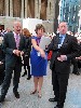 Marketing director Dawn Griffin preps Lord Foster and Rogers for the dedication ceremonies.