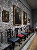 Combining Colonial art and furniture.