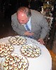 Blowing out the candles.