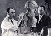 Arno Breker sculpting a portrait of Albert Speer.