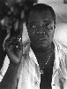 Louis Armstrong wearing a Star of David medallion.