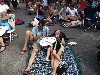 Hanging out listening to the music.