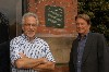 Steve Nelson and Don Law with the marker on the original Tea Party building (photo: Allan E. Dines)