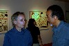 Former Globe critic Ken Johnson talking with John Moore during his NESAD opening.
