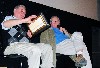 Lawson presenting a painting by Hannock to Dennehy.