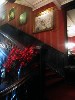 Prominently displayed above the stairs is another portrait of the James twins.