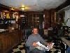 Miguel Serrano at his usual post in the now uncluttered reception area.
