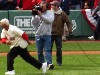 Yaz hurls the first pitch.