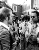 Charles Giuliano of the Boston Herald Traveler interviews Elton John at the launch party for his Rocket Records label at Universal Studios in Hollywood. Al Kooper and Rolling Stone writer David Felton listen in. Photographer unknown.