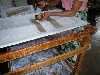 Applying wax to batik cloth