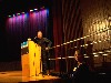 Hunter O&rsquo;Hanian addresses the first audience. Right, Janna Longacre of Massachusetts College of Art.