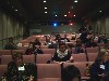 Audience at MIT waiting for a panel presentation.