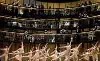 The striking setting provides an onstage audience to applaud the proceedings with us.