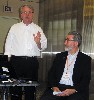 Tim Sink standing and Byron O. Champlin discussed arts initiatives in Concord, New Hampshire.