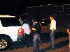 Gathering around the rescue vehicle.