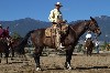 Buck Brannaman mounted up during one of his four day horse training clinics.