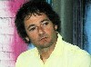 John Stirratt looks on.