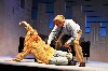 Greg (David Adkins) rubs the belly of a submissive and seductive Sylvia. Jaime Davidson production stills.