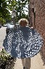 Jane carrying a paper embossing of steam manhole